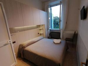 Postel nebo postele na pokoji v ubytování Hotel Cilene