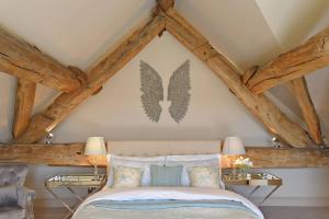 Una cama o camas en una habitación de Horseshoe House