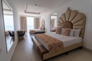 Postel nebo postele na pokoji v ubytování Hotel Cartagena Dubai