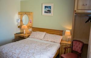 Postel nebo postele na pokoji v ubytování Algret House B&B
