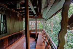 Balkón nebo terasa v ubytování Kalpavanam Heritage Resort
