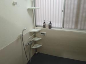 Ένα μπάνιο στο Mike's B&B Tokoname