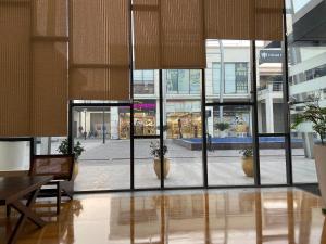 a view of a shopping mall with glass windows at HOTEL ICON Rajpura in Rājpura