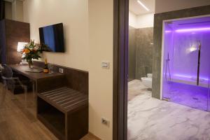 TV a/nebo společenská místnost v ubytování Hotel Concord