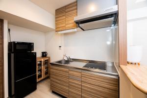 Dapur atau dapur kecil di Tomariehotel & condominium +43 gambar