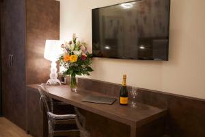TV a/nebo společenská místnost v ubytování Hotel Concord