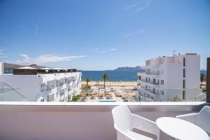 a view of the beach from the balcony of a hotel at Cabot Hobby Club Apartments in Port de Pollensa