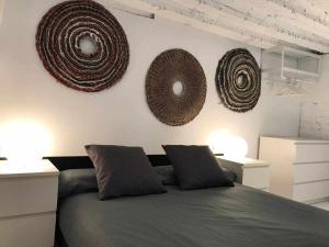 A bed or beds in a room at Almudena Modern & luxury space near Plaza Mayor