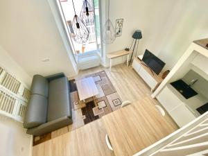 TV a/nebo společenská místnost v ubytování Studio La Pietonne-plage-clim