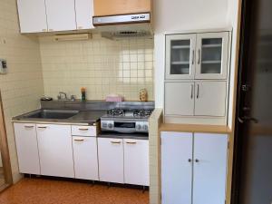 Кухня или мини-кухня в ACT Residence NO.2

