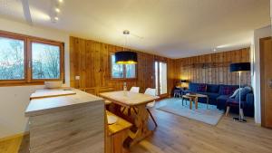 Posezení v ubytování Cozy apartment in Veysonnaz, close to the slopes of the 4 Valleys