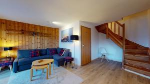Posezení v ubytování Cozy apartment in Veysonnaz, close to the slopes of the 4 Valleys