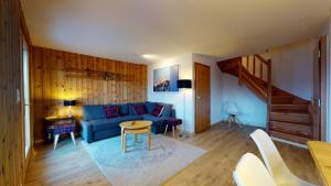 Posezení v ubytování Cozy apartment in Veysonnaz, close to the slopes of the 4 Valleys