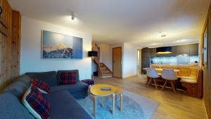 Posezení v ubytování Cozy apartment in Veysonnaz, close to the slopes of the 4 Valleys + 22 fotografií