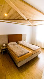 Postel nebo postele na pokoji v ubytování Hotel Central Résidence