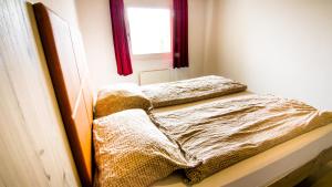 Postel nebo postele na pokoji v ubytování Hotel Central Résidence