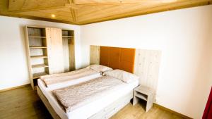 Postel nebo postele na pokoji v ubytování Hotel Central Résidence