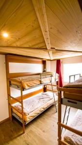 Postel nebo postele na pokoji v ubytování Hotel Central Résidence