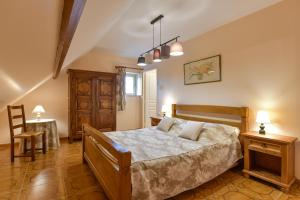 Postel nebo postele na pokoji v ubytování Gite du Clos Champagnac