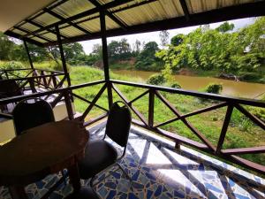 a view of a river from a boat at RS Phong Riverside Resort in Khon Kaen