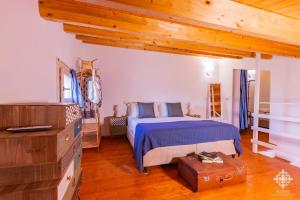Postel nebo postele na pokoji v ubytování Beach Front Villas