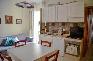 A kitchen or kitchenette at Noera Home