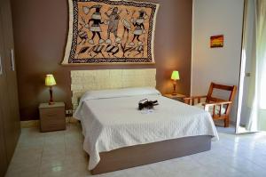 A bed or beds in a room at Noera Home