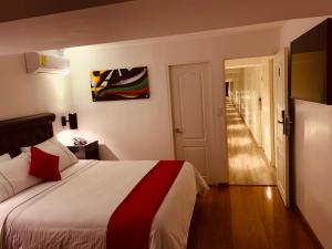 Postel nebo postele na pokoji v ubytování Hotel Veler