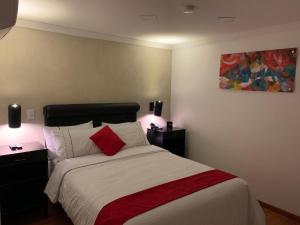 Postel nebo postele na pokoji v ubytování Hotel Veler