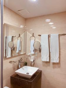 Koupelna v ubytování Hotel Veler