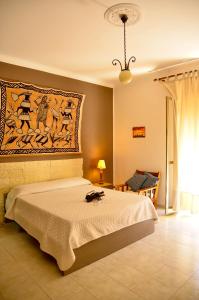 A bed or beds in a room at Noera Home