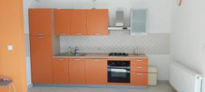 Kuchyň nebo kuchyňský kout v ubytování Seaside apartments