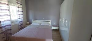 Postel nebo postele na pokoji v ubytování Seaside apartments