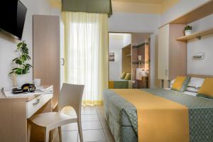 TV a/nebo společenská místnost v ubytování Hotel Principe