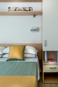 Postel nebo postele na pokoji v ubytování Hotel Principe