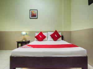 Cama o camas de una habitación en OYO 636 Alpha's Place Bed And Breakfast