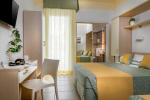 TV a/nebo společenská místnost v ubytování Hotel Principe