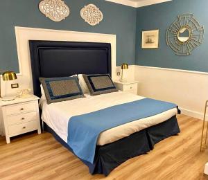 Postel nebo postele na pokoji v ubytování Hotel Goya