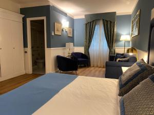 Postel nebo postele na pokoji v ubytování Hotel Goya