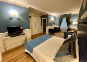 TV a/nebo společenská místnost v ubytování Hotel Goya