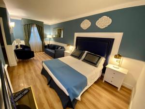 Postel nebo postele na pokoji v ubytování Hotel Goya