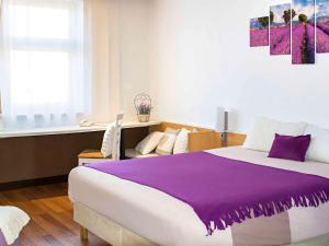 Ένα ή περισσότερα κρεβάτια σε δωμάτιο στο Ibis Bratislava Centrum