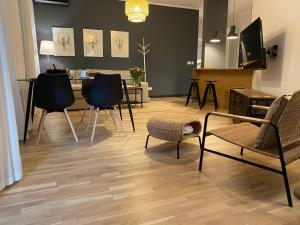TV a/nebo společenská místnost v ubytování Apartament Krzysztofa Bochusa