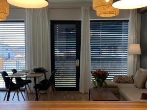 Posezení v ubytování Apartament Krzysztofa Bochusa