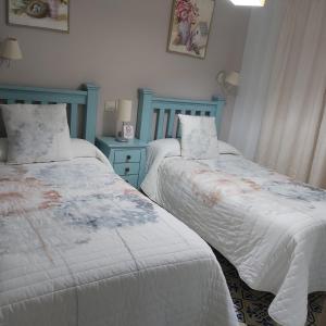 Cama o camas de una habitación en Vivienda Rural Rio Cerezuelo