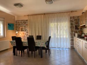 Kuchyň nebo kuchyňský kout v ubytování Seaside apartments
