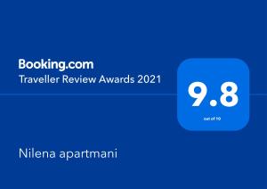 uno screenshot di un cellulare con i premi per la recensione di "Viaggiatori di testo" di Nilena apartmani a Smederevo