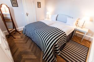 Postel nebo postele na pokoji v ubytování Hotel Fredensborg Store Kro