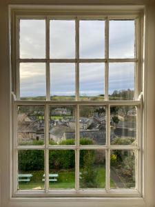 a window with a view of a town at Harts Head Hotel in Settle