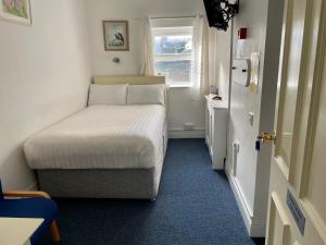 Letto o letti in una camera di An Stór Townhouse